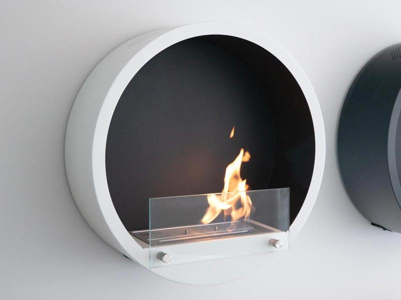 Round white wall mounted fireplace